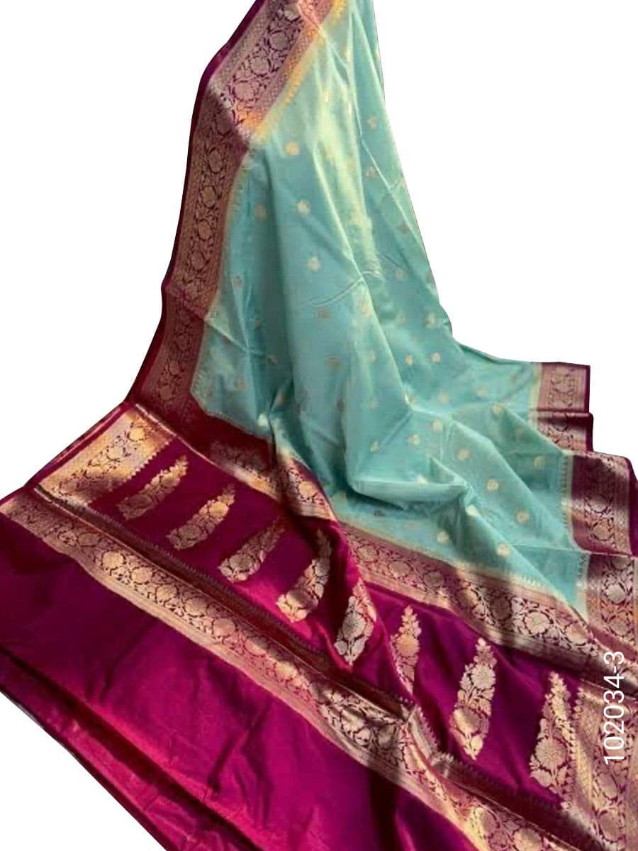 Turquoise kora organza zari buti saree